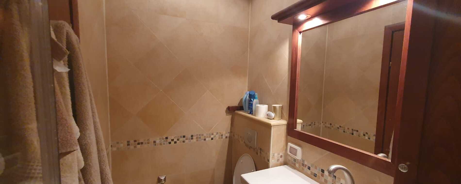 assets/images/properties/ER33 Main Floor Guest Bathroom Pic1 (CapitIL).jpg